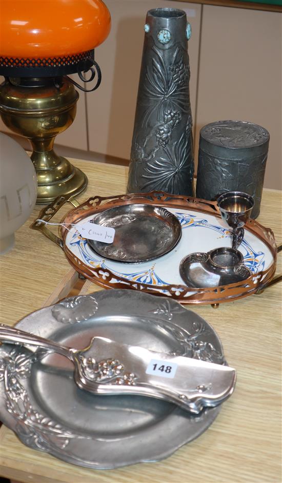 Eight pieces of Arts & Crafts metalware tallest 29cm